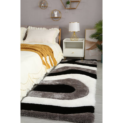 Tapis à poils longs Mateos au design abstrait