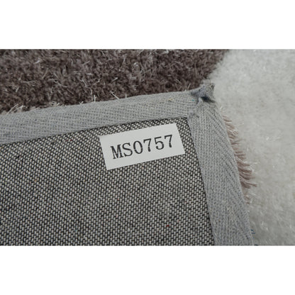 Tapis à poils longs Mateos au design abstrait