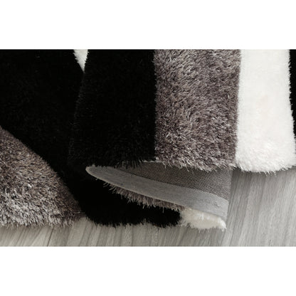 Tapis à poils longs Mateos au design abstrait