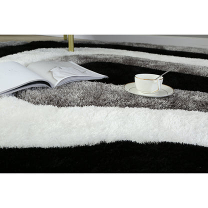 Tapis à poils longs Mateos au design abstrait