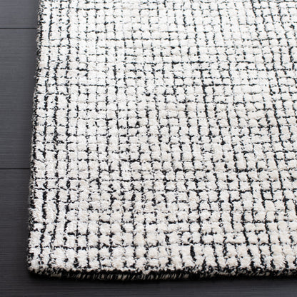 SAFAVIEH Handmade Abstract Marikka Modern Viscose Rug