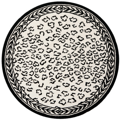 SAFAVIEH Handmade Chelsea Solar Garden Leopard French Country Wool Rug