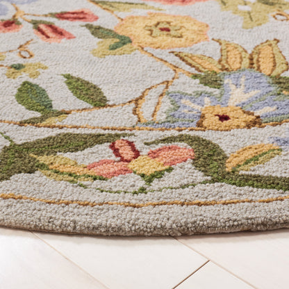 SAFAVIEH Handmade Chelsea Yauhenia French Country Floral Wool Rug