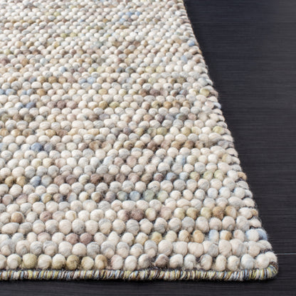 SAFAVIEH Handmade Natura Gonnie Wool Rug
