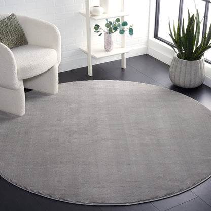 SAFAVIEH Revive Avie Solid Rug