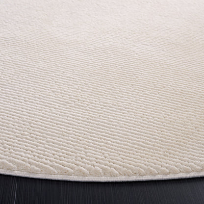 SAFAVIEH Revive Avie Solid Rug