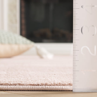 SAFAVIEH Revive Avie Solid Rug