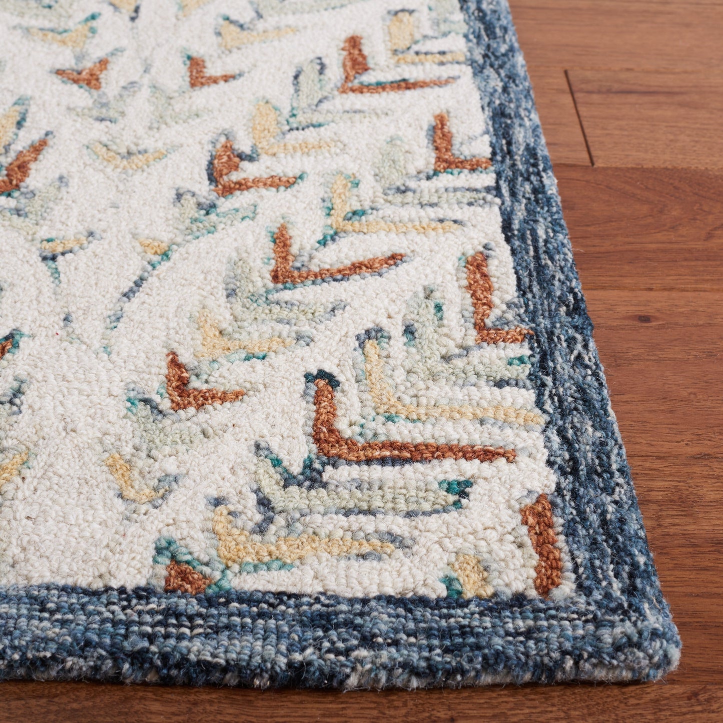 SAFAVIEH Handmade Capri Kert Wool Rug