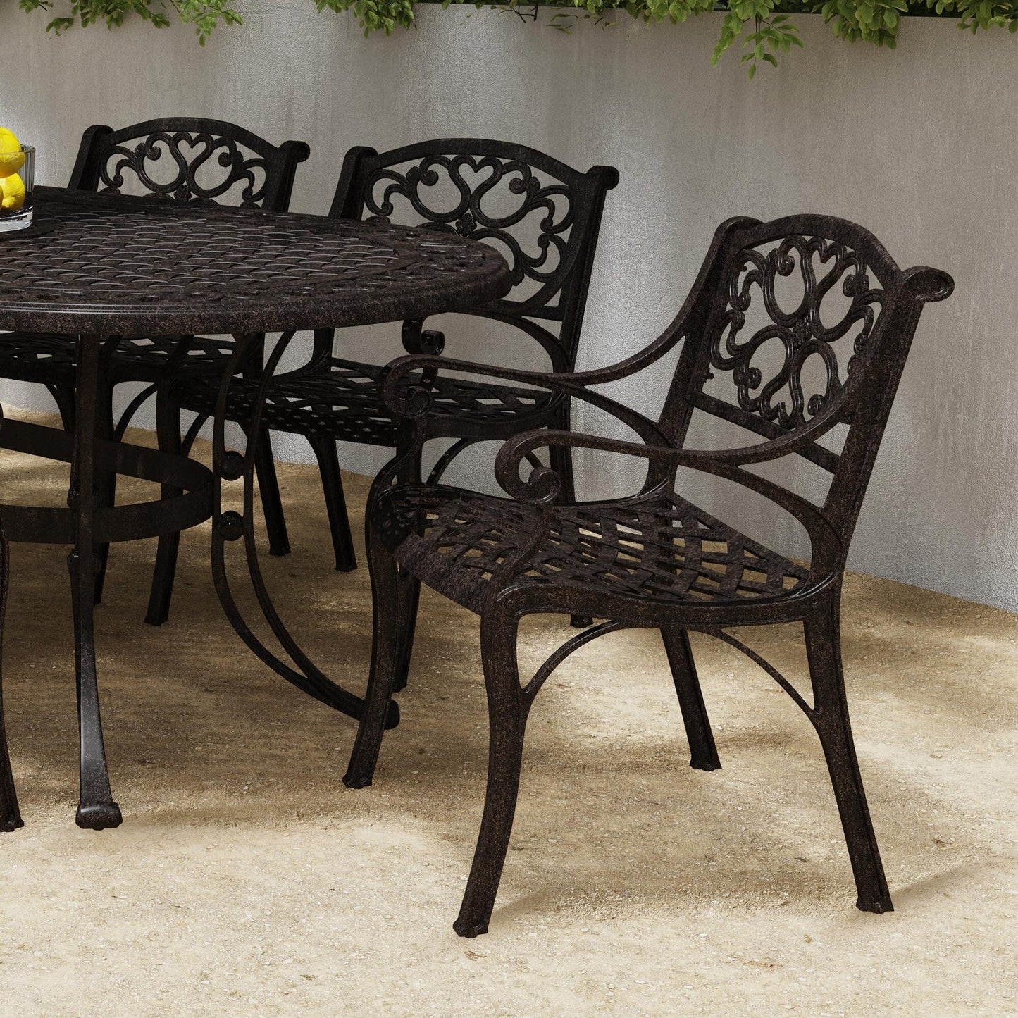 Sanibel Bronze Aluminum 7- Piece Outdoor Dining Set with 72 Oval Dining Table and Six Armchairs by Homestyles